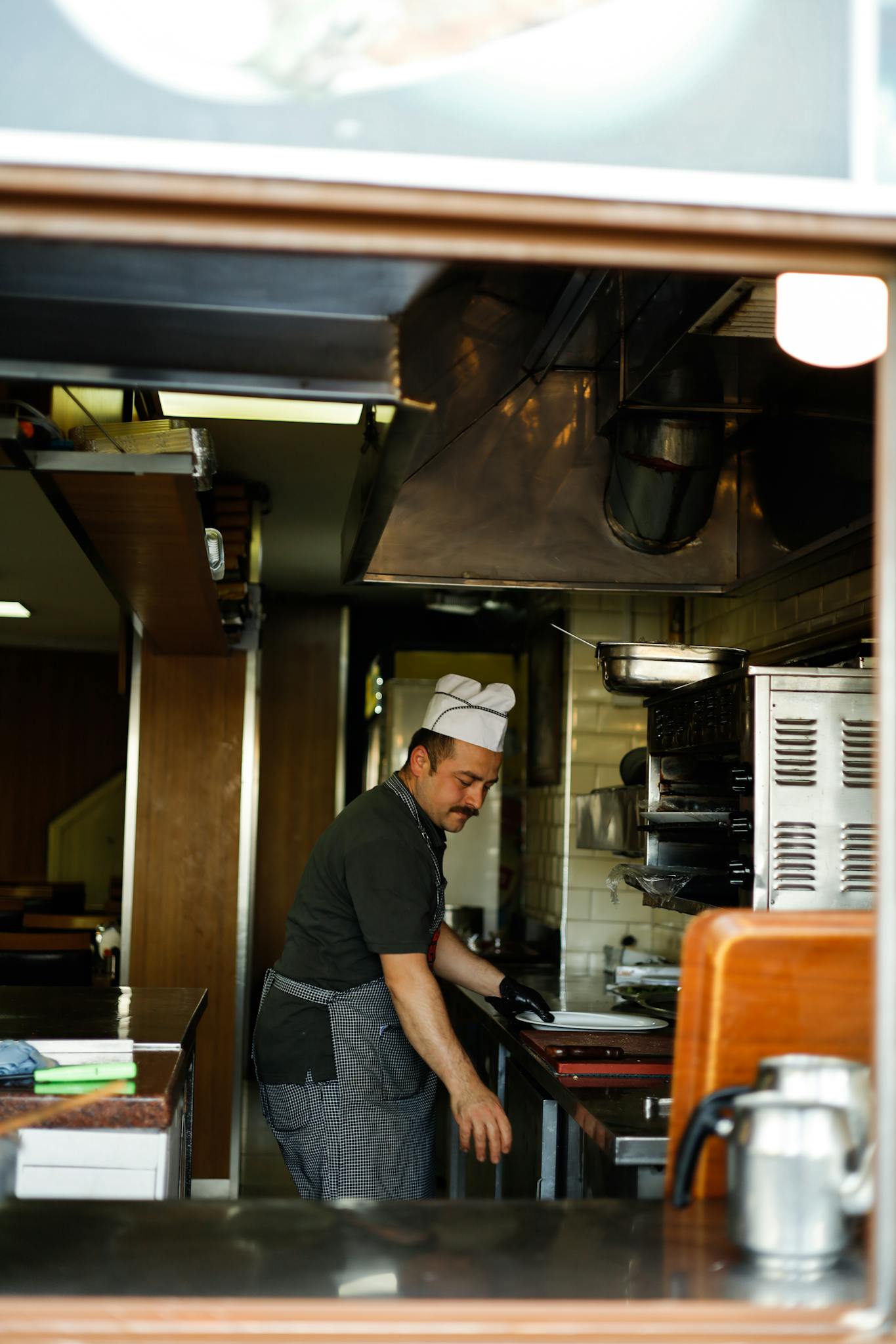 chef-working-in-a-warm-kitchen-environment